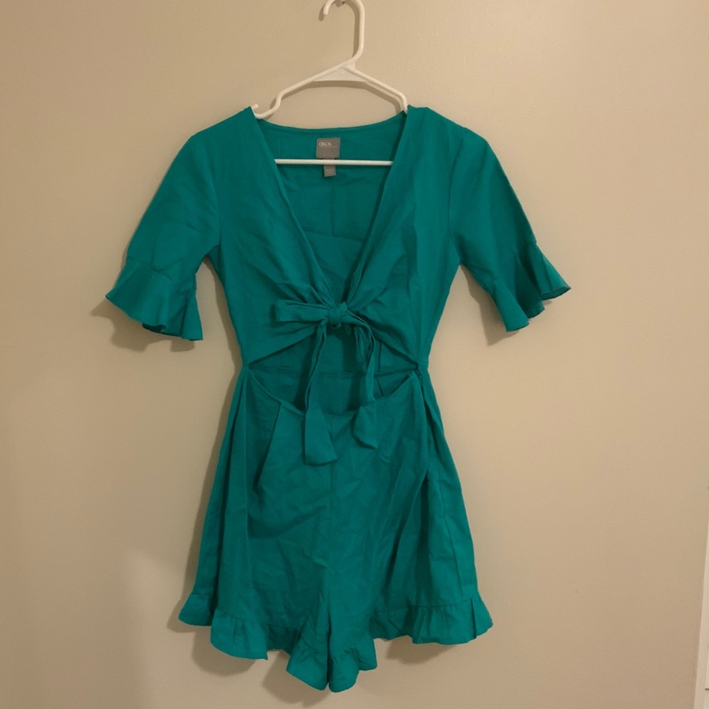 Turquoise romper/ bow tie front/ peek a boo